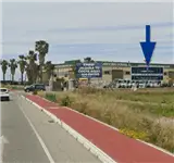Valla publicitaria en la antigua Ctra. de Jerez (A-471) en Sanlúcar de Barrameda